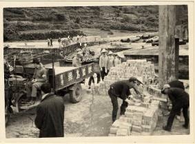 Construction materials (bricks) from Taiwan were transported by three-wheeled cart at Green Island Nanliao Harbor.